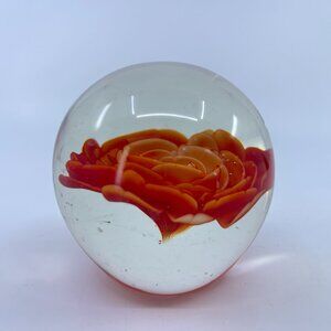 handcrafted art glass paperweight with intricate red-orange rose design